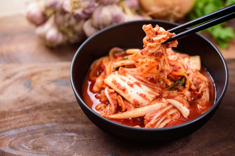 Bowl of kimchi with health prebiotics, which increase probiotics in the body.