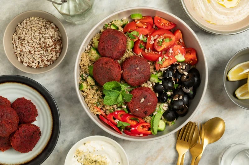 Top view of a colorful and nutritious falafel salad, showing that nutrition as a functional medicine intervention